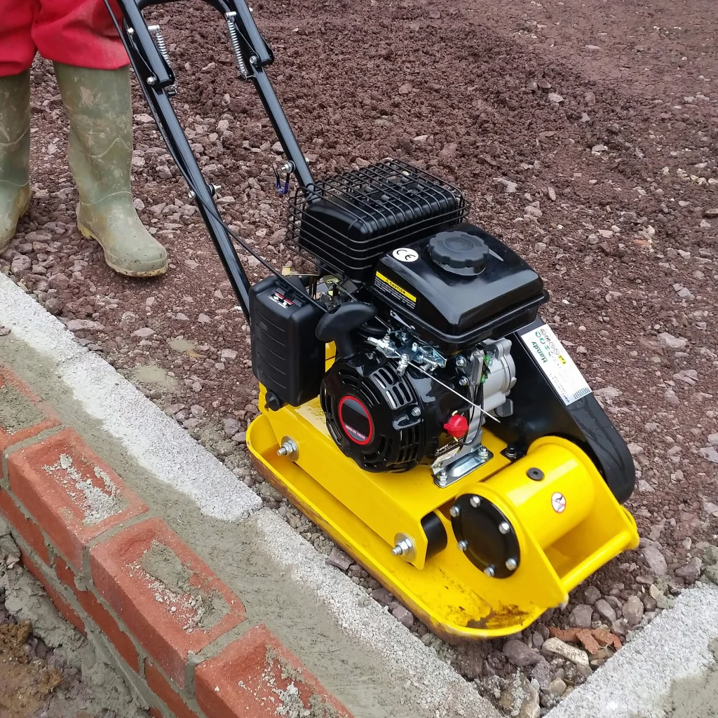 The Handy Light Construction THLC29140 30cm (12″) Petrol Compactor wacker Plate in use